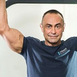 Charles Poliquin talking about thick arms, fat grips